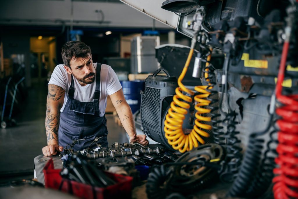 mechanic checking car's condition
