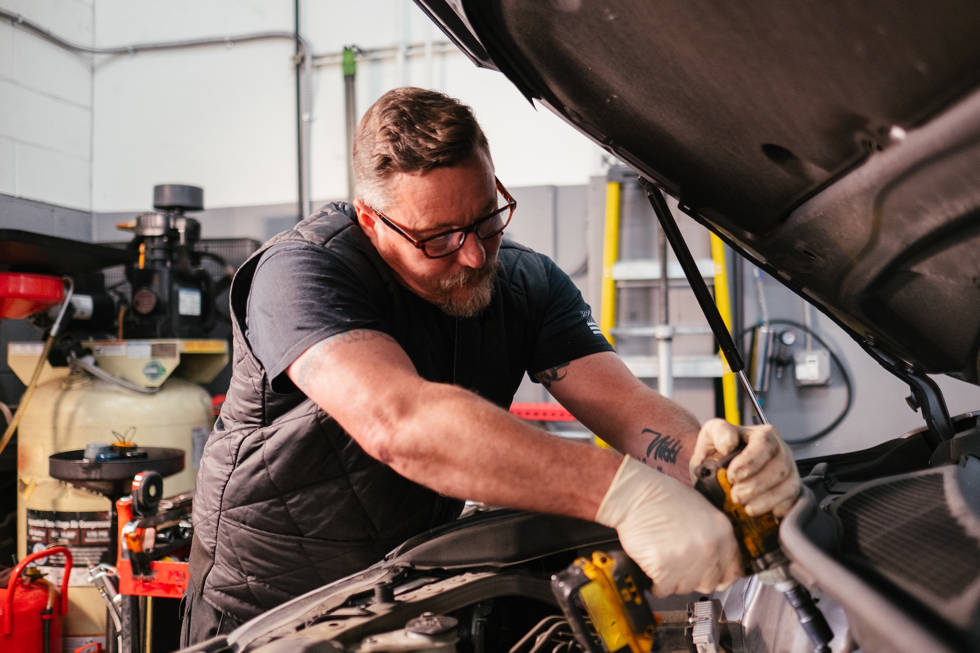 mechanic working on car