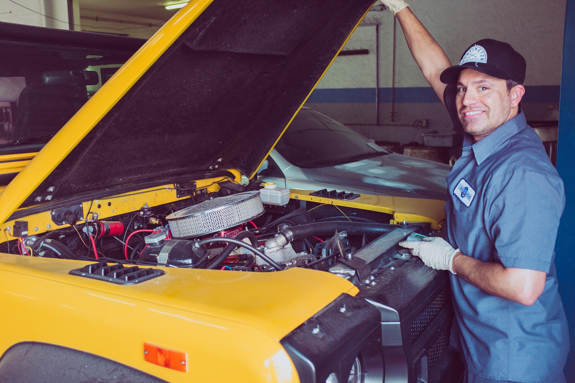 mechanic checking vehicle