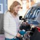 person holding a gas pump
