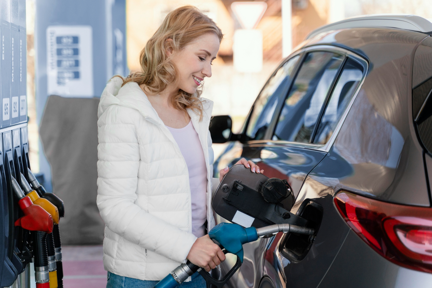 person holding a gas pump