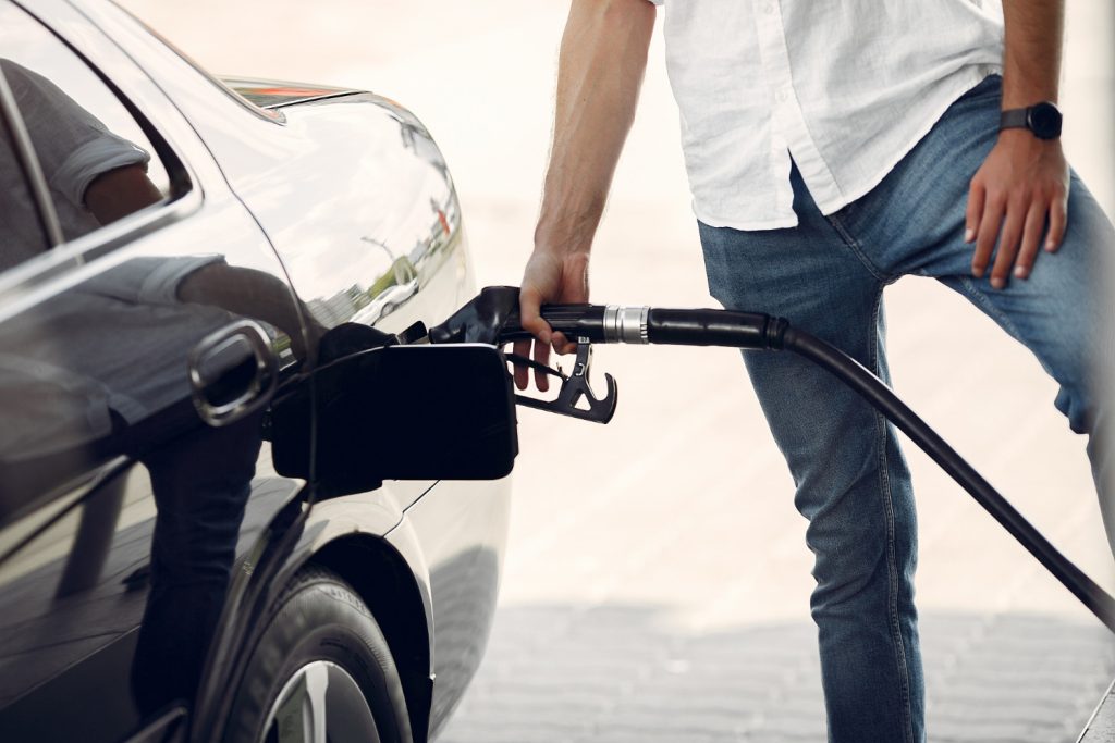 putting gasoline on a vehicle