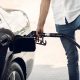 putting gasoline on a vehicle