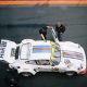 inspecting a race car