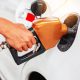 person holding gas pump
