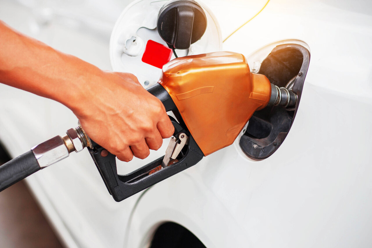person holding gas pump